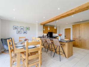 a kitchen and dining room with a table and chairs at The Vintage Store - Uk32652 in Elston