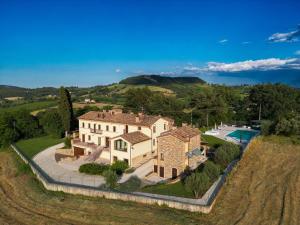 an aerial view of a house with a pool at Bea Villa Bea in Caldarola