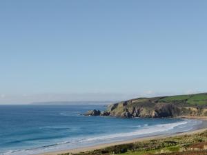 a view of a beach and the ocean at The Barn in Carleen