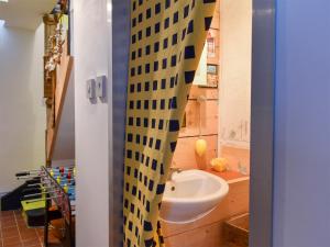 a bathroom with a sink and a toilet in it at Fronks House in Harwich