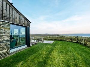 a house with a view of the ocean at Clarsach in Big Sand