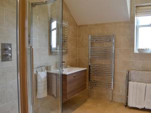 a bathroom with a shower and a sink at Yonderton House - Uk11181 in Hollybush
