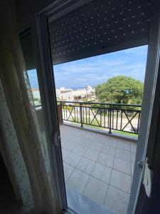a view from the door of a balcony at Nelli rooms in Polychrono