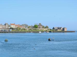 two small boats in a large body of water at Heron House in Tweedmouth