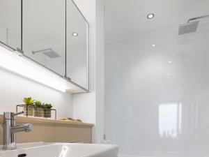 a bathroom with a sink and a mirror at Apartment 22, Horizon View in Westward Ho