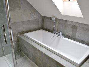 a bathroom with a shower and a sink at Salar's Rest - 28028 in Alnmouth