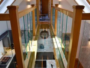 an overhead view of a glass floor in a house at Hillend Stables in Dalry