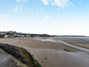 an aerial view of a sandy beach with houses at Beachey View - Uk43058 in Saundersfoot