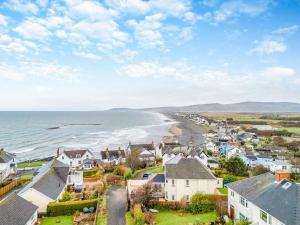 an aerial view of a small town next to the ocean at Bryndedwydd in Borth +22 photos