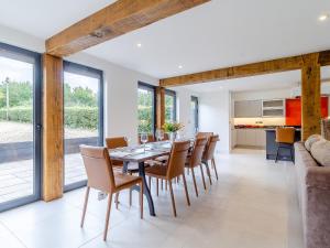 a dining room with a table and chairs at Kestrel Barn-Uk31353 in Swaffham