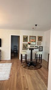 a living room with a table and two chairs at Baklava in Sarajevo