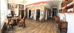 a room with a table and chairs and a dining room at mithwood in Nuwara Eliya