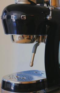 a close up of a sewing machine with a mirror at Relaxury Villa II in Karpathos