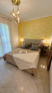 a bedroom with a large bed in a room at Dimora degli Ulivi in Bagnaia +41 photos