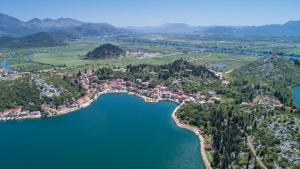 an aerial view of a town on a lake at Stella Maris in Ploče