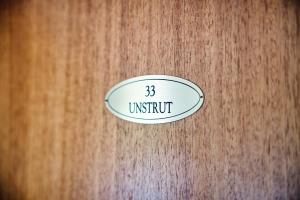 a wooden door with a sign that reads insufficient at Schiffshotel Böttger in Dresden