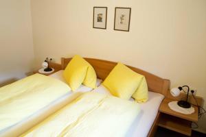 Łóżko lub łóżka w pokoju w obiekcie Ferienhaus Nationalpark