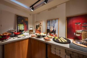 a kitchen with a buffet of food on a counter at Casa Lume in Bodrum City