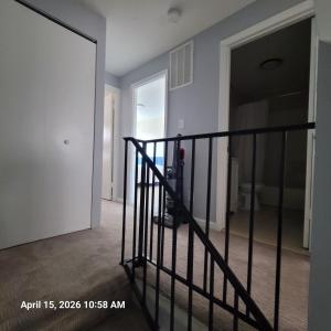 an empty hallway with a staircase in a house at The Haven in Dundalk