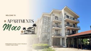 a rendering of a building with the words apartments mooc at Apartmani Moco in Ulcinj