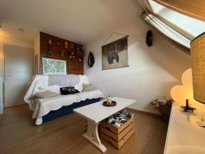 a living room with a couch and a table at Chalet Les Angles in Les Angles