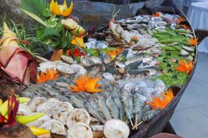 a display of fish and shells on a table at Pandanus Resort in Mui Ne