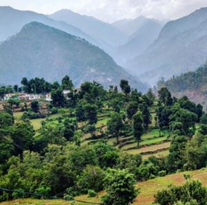 a view of a valley with mountains in the background at Shree Kedar dham Guest House in Gupta Kāshi