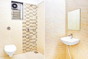 a bathroom with a toilet and a sink at Super Collection O Baner Formerly Seven Hills in Pune
