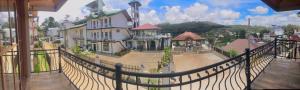 a view of a town from a balcony of a building at mithwood in Nuwara Eliya