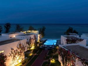 an aerial view of a building at night at Nungwi Dreams by Mantis in Nungwi +141 photos