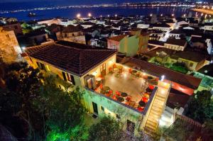 an aerial view of a building at night at Marianna in Nafplio