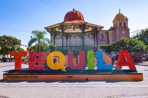 a sign that says hello in front of a gazebo at Hotel Casa Victoria in Tequila