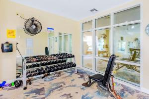 a room with a bunch of wine bottles on display at Legacy Tower I in Gulfport