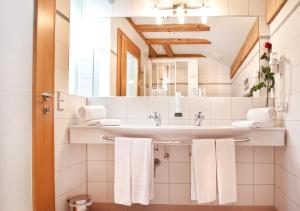 Koupelna v ubytování Hotel Binggl