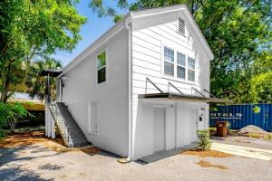 a white house with a garage at Hopkins 144 in Biloxi