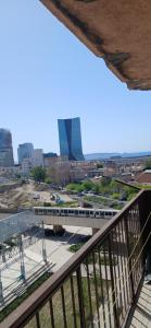 a view of a city from a balcony at lits superposé in Marseille