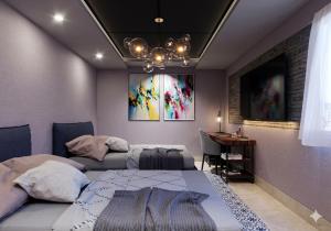 a room with two beds and a desk in it at Casa7Cielos in Monterrey +20 photos