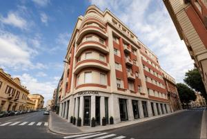 a building on the side of a street at The Central Stay Cagliari in Cagliari