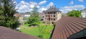 a view of a house from a roof at Manoir La Cerise in Fougerolles