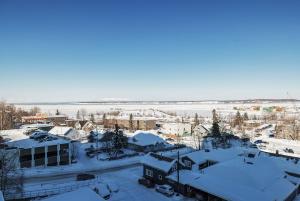 an aerial view of a city covered in snow at Modern Downtown Studio - King Bed - Inlet Views in Anchorage