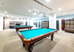a pool room with two pool tables in it at Panoramic Lakeview Resort Living 3BDR with Gym, Pool, Free parking in Toronto