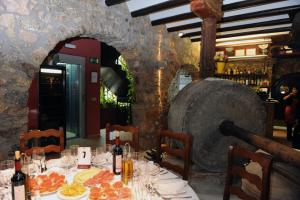 Nápoje v ubytovaní Hotel Restaurant Verdià