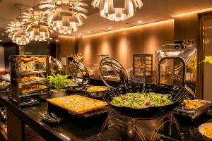 a buffet line with many different types of food at The Cloud Hotel in Kaohsiung +41 photos