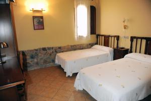 Posteľ alebo postele v izbe v ubytovaní Hotel Restaurant Verdià
