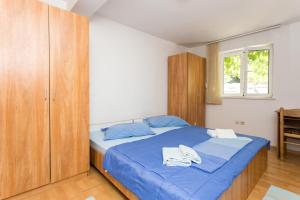 Cama o camas de una habitación en Hrvoje Place Apartments