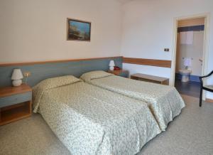 Кровать или кровати в номере Hotel Stella Maris