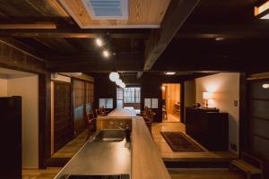 a kitchen with a sink and a counter top at RITA Okawa Hanzakai in Wakatsu