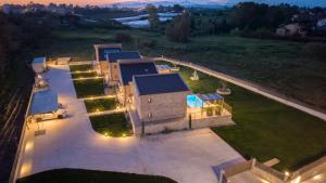 an aerial view of a house with a solar roof at Vagg Villas in Preveza