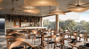 a restaurant with wooden tables and chairs and large windows at NANANA Hotel de Mar - Solo Adultos in Puerto Escondido