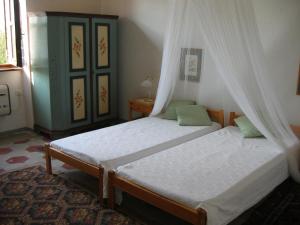 Postel nebo postele na pokoji v ubytování B&B Monvicino